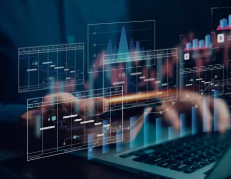 Data analytics dashboard with financial charts on a laptop